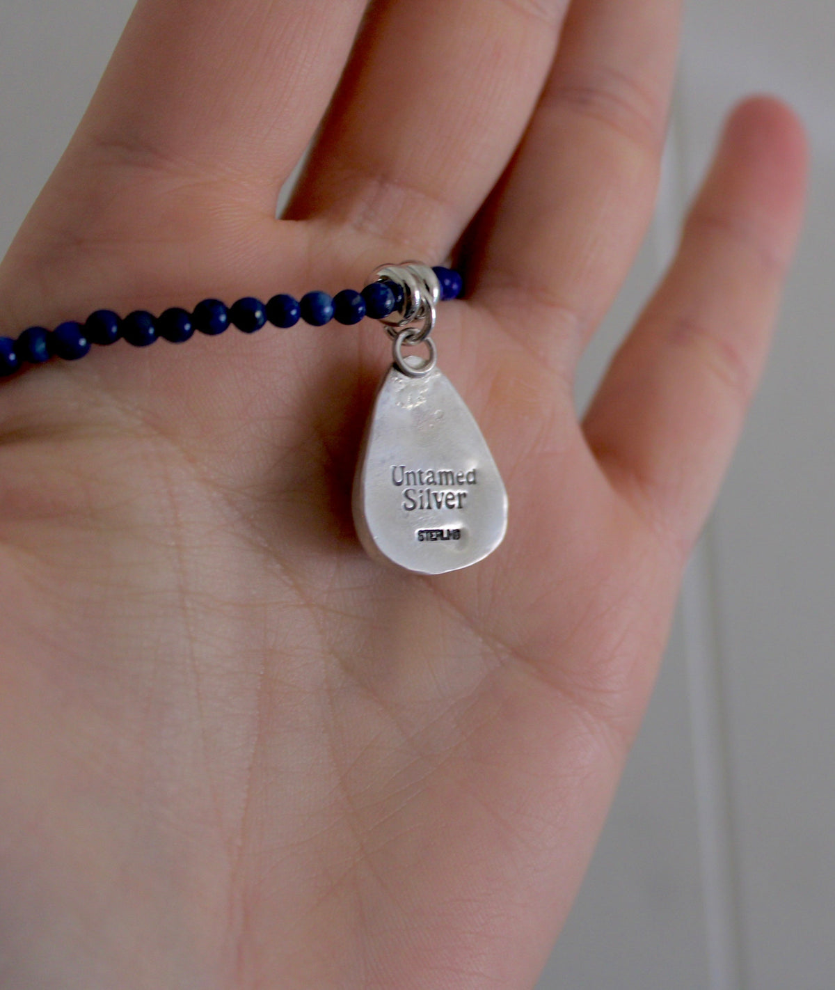Lapis Lazuli Bead Necklace with White Buffalo Turquoise pendant